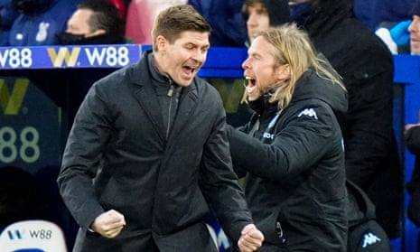 Steven Gerrard celebrates on the sideline as Matt Targett of Aston Villa scores the opening goal .