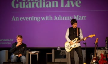 Johnny Marr seen onstage with John Harris. Credit: Alicia Canter