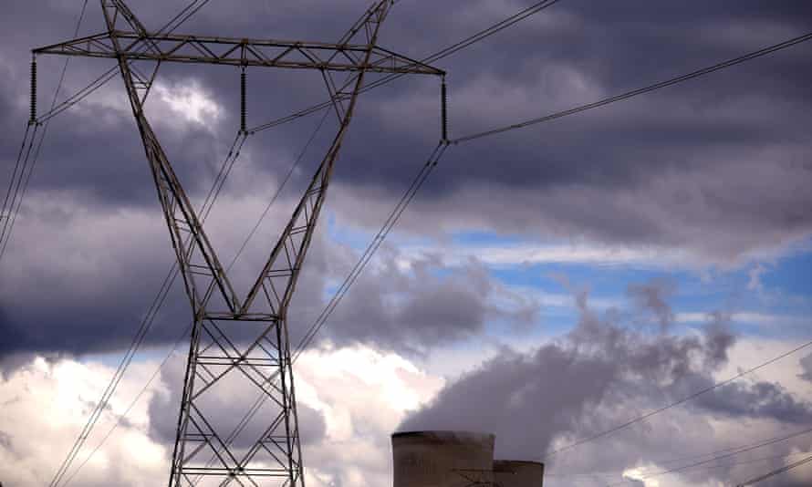 Powerlines and storm clouds above the Bayswater coal-fired power station near Muswellbrook, Australia