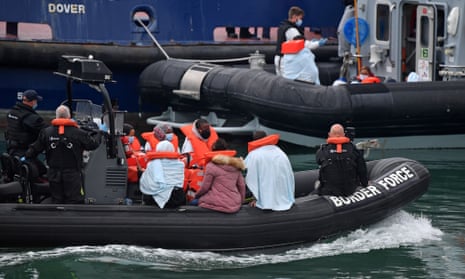 UK Border Force officials arrive in Dover with migrants picked up while crossing the Channel.