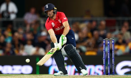 England keep T20 World Cup hopes alive with victory over New Zealand | T20 World Cup 5 Jos Buttler plays a ramp shot during his innings of 73 at the Gabba.