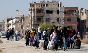Civilians being evacuated from Darayya in 2016. Shia families from Iraq later moved into the abandoned neighbourhoods.