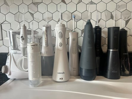 10 water flossers on a worktop