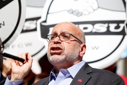 a man speaks into a microphone