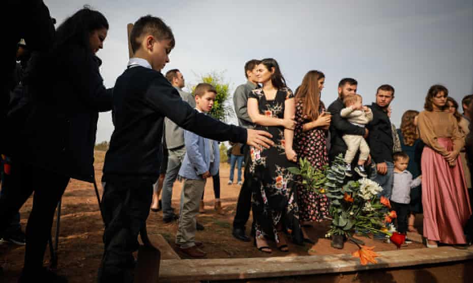 Members of local Mormon communities and relatives of the extended Le Baron family lay flowers during the funeral held for Christina Johnson on November 09, 2019 in Le Barón, Mexico