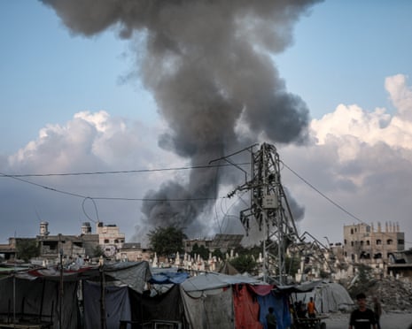 Smoke rises over residential areas after the Israeli army's attacks on ez-Zeytun neighbourhood in southern Gaza City on Wednesday, 27 August 2025.