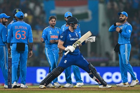 India's players celebrate after the dismissal of England's Liam Livingstone.