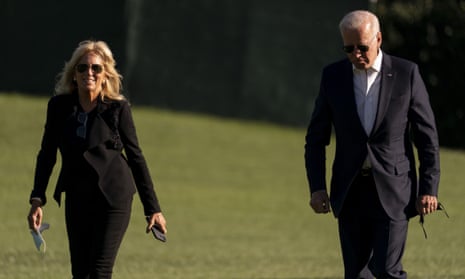 President Joe Biden and first lady Jill Biden arrive at the White House in Washington.