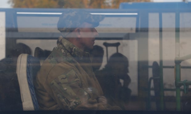 Surrendered servicemen of Ukraine’s Azov regiment being transferred to Yelenovka in Mariupol in May.