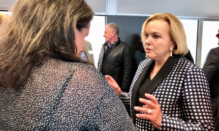 Judith Collins speaks to a supporter at the Otago Chamber of Commerce in Dunedin