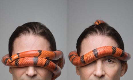 Steve Ludwin with a snake round his head