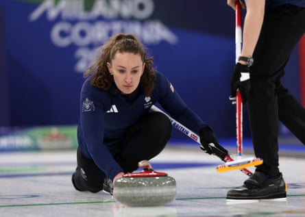 Jen Dodds slides a curling stone.
