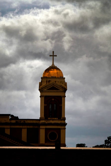 dark clouds over a church