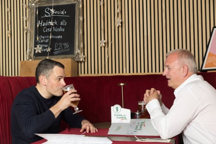 Martyn and Alan chatting across a restaurant table