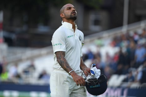 Dhawan reacts after losing his wicket for 44.