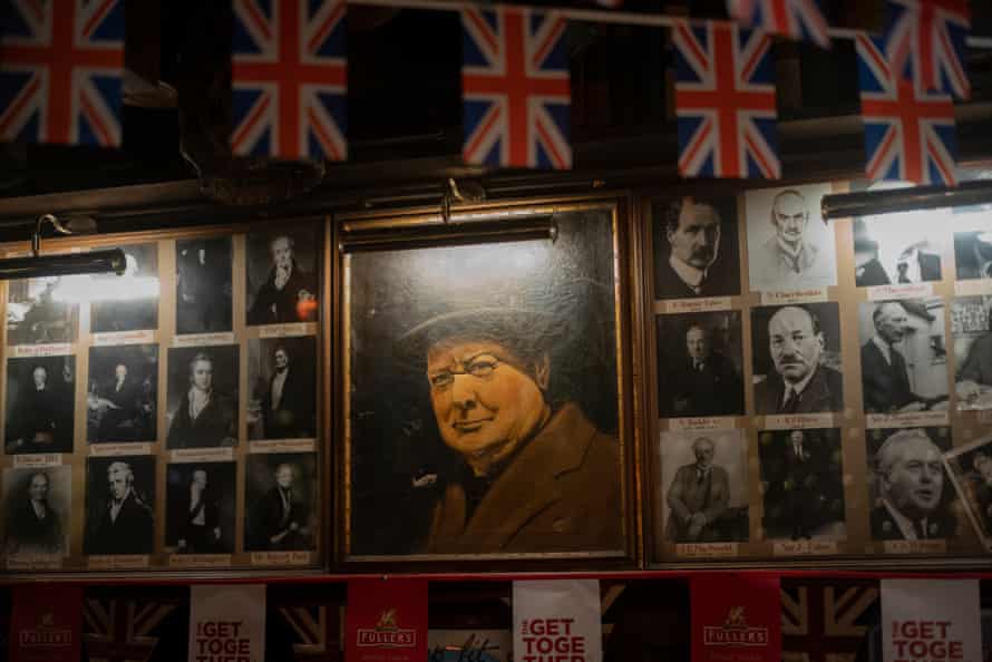 Memorabilia and photographs adorn the pub’s interior.