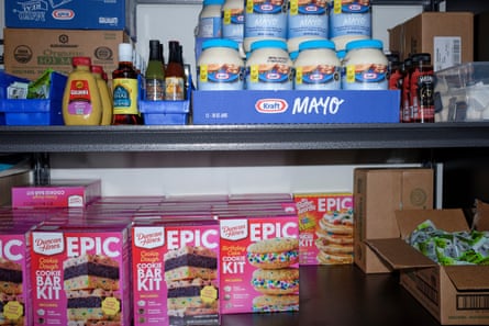 Shelves are stocked with food and supplies inside the Food Resource Center at Hamline University in Saint Paul, Minnesota. The center serves as a community space where students and faculty can access free food with no questions asked.