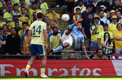 Manchester City's Tijjani Reijnders tries an overhead kick.