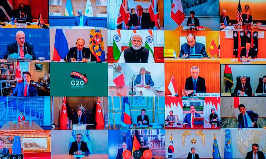 A television screen at the Palazzo Chigi in Rome shows a video conference between G20 leaders