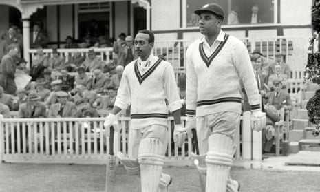 Andy Ganteaume, left, walks out to bat with Clyde Walcott in a West Indies tour match against Worcestershire in 1957.