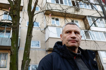 Kyiv Mayor Vitali Klitschko visits the site of an apartment building hit during the overnight Russian drone and missile strikes