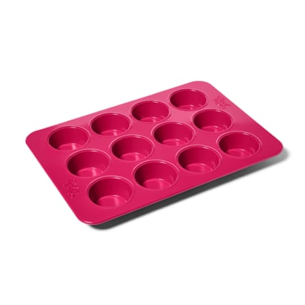 Great Jones Stud Muffin pan in pink