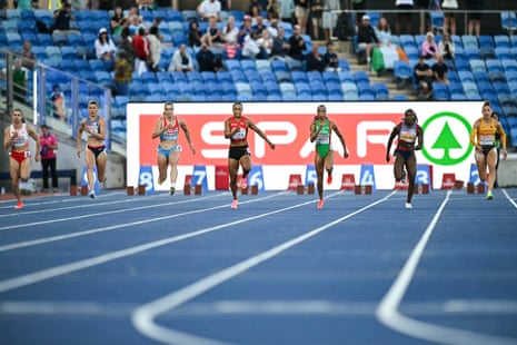 Poland's Krystsina Tsimanouskaya, Britain's Amy Hunt, Luxembourg's Patrizia Van Der Weken, Switzerland's Salome Kora, Portugal's Tatjana Pinto, Britain's Dina Asher-Smith and Germany's Gina Luckenkemper compete in the women's 100m semi-final