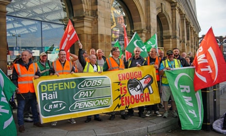 RMT members on a picket line outside Liverpool Lime Street station in July