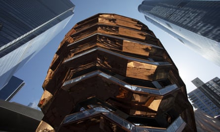 Vessel, a 150ft-tall structure of climbable interlocking staircase, rises above Hudson Yards in New York.