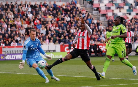 Brentford's Dango Ouattara in action with Fulham's Bernd Leno.