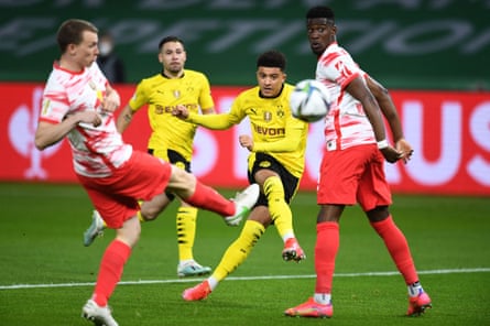 Jadon Sancho scores for Borussia Dortmund in the German Cup final win against RB Leipzig in May.