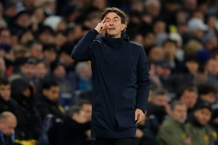 Thomas Frank points to his head