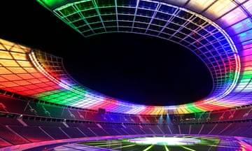 Berlin’s Olympic Stadium is lit up with the colours of the new Euro 2024 logo
