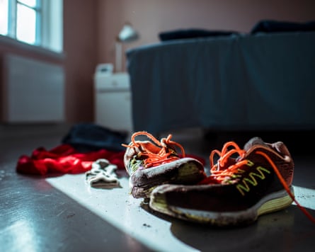 Close up of shoes and clothing of an athlete after a workout