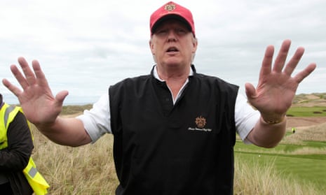 Donald Trump gesturing during a tour of his new Trump International Golf Links course near Aberdeen.