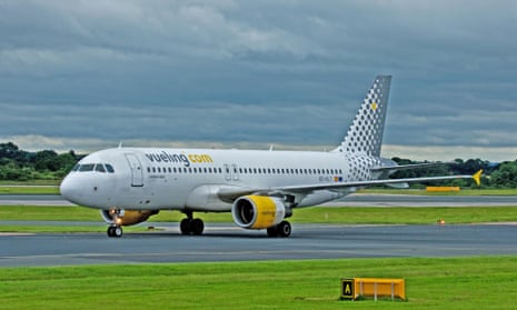 A Vueling plane at an airport