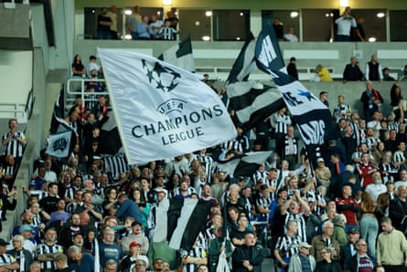 Newcastle fans wave flags before the Champions League league phase match against Barcelona at St Jamesâ Park in September 2025