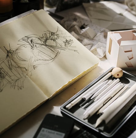 A sketchbook and pens