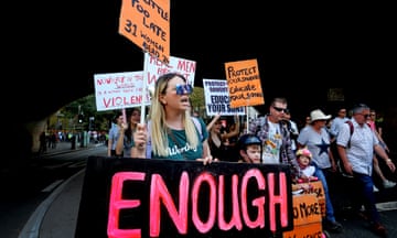Protesters take part in a national rally against violence towards women in Sydney, Australia