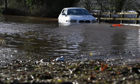 Flood water after the River Eden overflowed its banks during Storm Isha, near Warwick Bridge, north-west England.