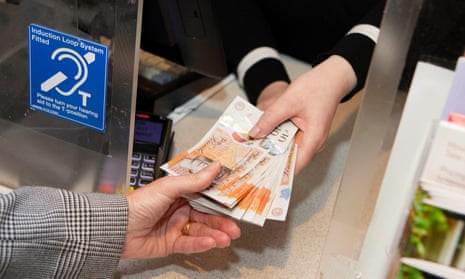 Cashier handing over money