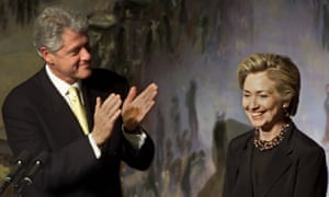 President Bill Clinton applauding first lady Hillary in 1999.