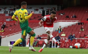 Arsenal’s Pierre-Emerick Aubameyang controls the ball shoots and scores a goal.