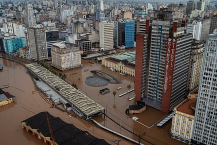 An aerial shot of central Porto Alegre reveals the extent of flooding damage to the public market and city hall.