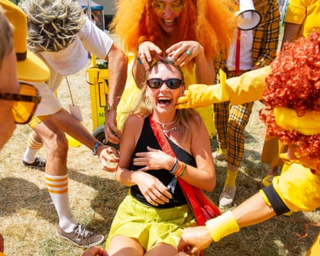 Welcome to the Ministry of Happiness! Glastonbury kicks off for 2025 – photo essay