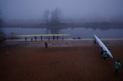 Two of the Cambridge University Boat Club women’s boats head out in the early morning for a training session on the Great Ouse, Cambridgeshire on 28 February 2024.