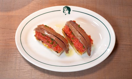 ‘Draped with two fat Cantabrian anchovies’: pan con tomate.