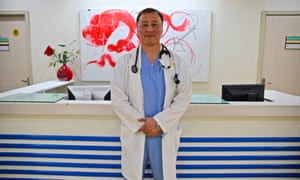 Dr Namkhaidorj stands in a clinic reception