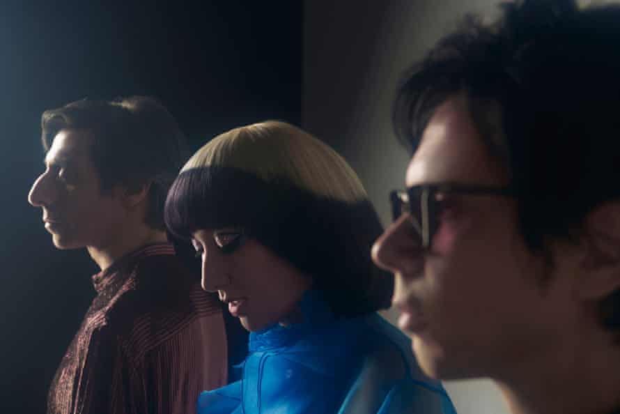 The trio in 2022, facing sideways.