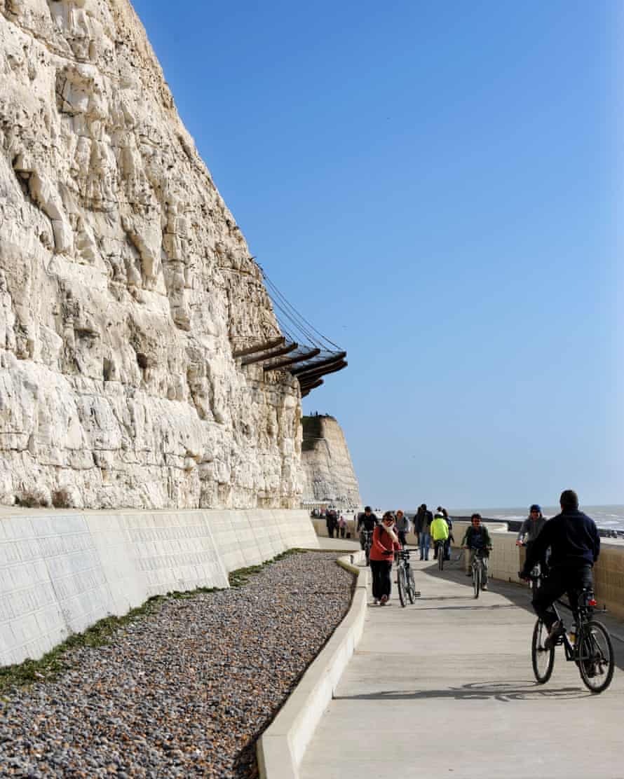 People walking and cycling along the undercliff path that runs from Brighton to Saltdean.
